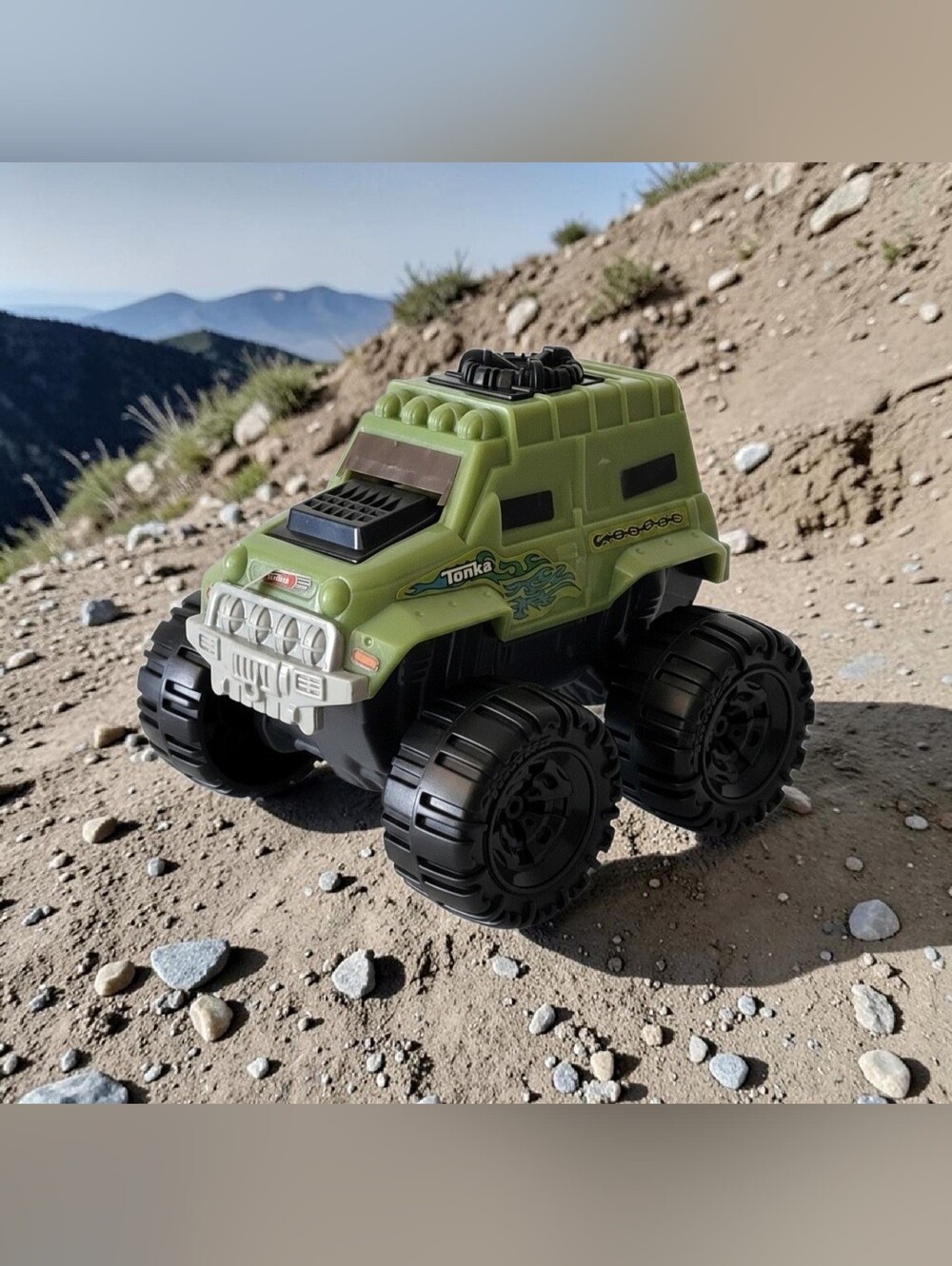 2011 McDonald's Hasbro Tonka Garage Monster Truck Rotating Engine & Spare Tire.